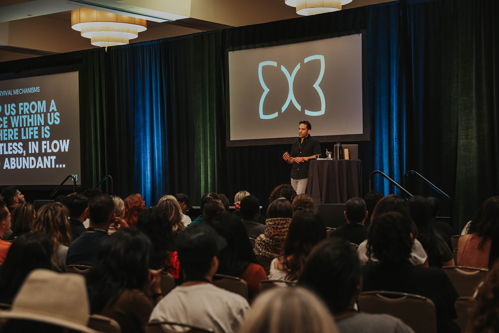 YES Events Agency live coaching event with packed audience